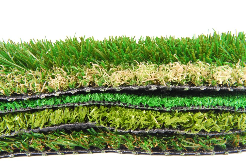 Synthetic lawns in various shades of green and yellow