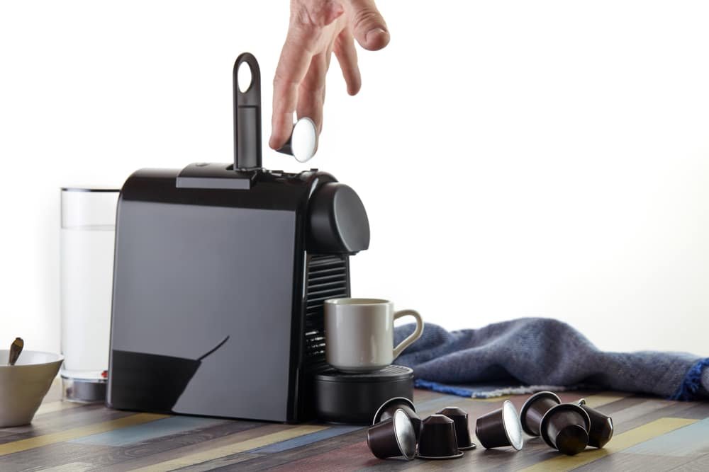 Loading a capsule into a kitchen appliance