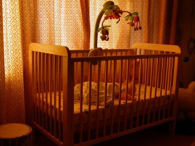The baby sleeps soundly in the room
