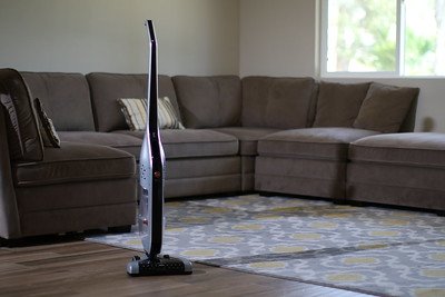 cleaning equipment tool and brown sofa
