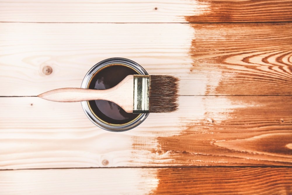 when to oil new decking