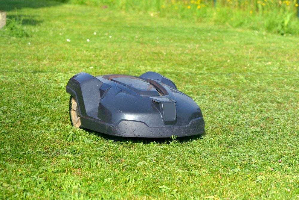 how does a robotic lawn mower work